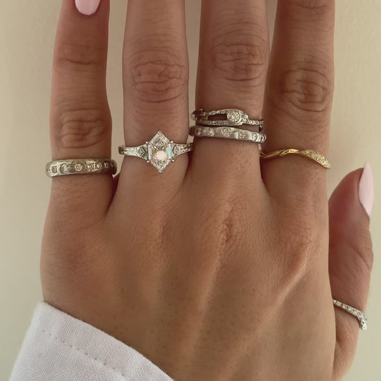 caption:Shown with 1.5ct step cut dutch marquise in platinum 