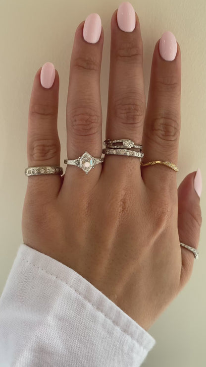 caption:Shown with 1.5ct step cut dutch marquise in platinum 