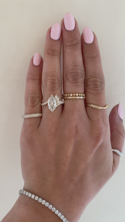 caption:Shown with 2.2ct marquise diamond in 14k yellow gold 