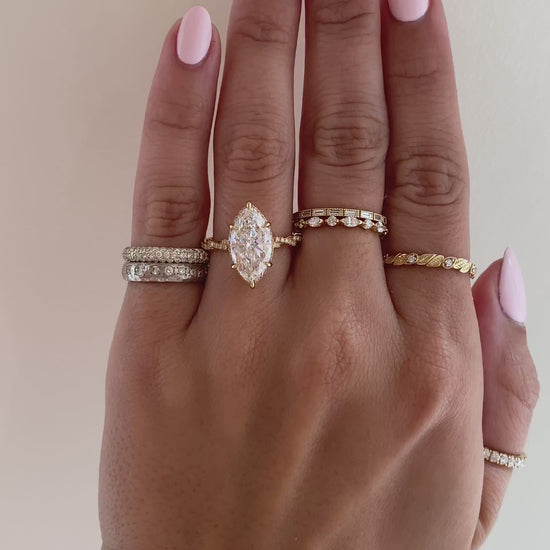 caption:Shown with 3ct marquise in 18k yellow gold 