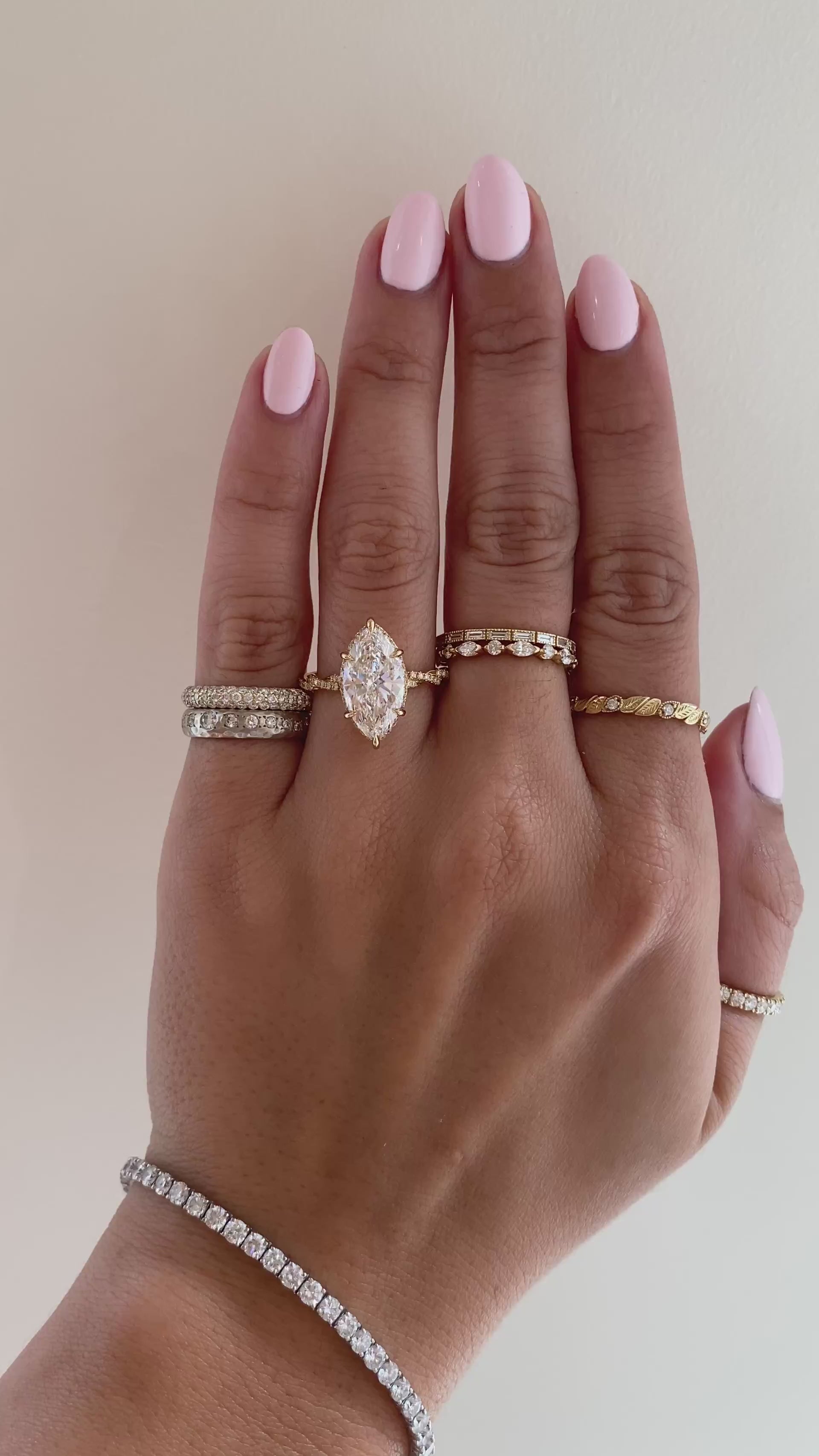 caption:Shown with 3ct marquise in 18k yellow gold 