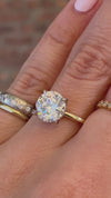 caption:Shown with 2.5ct round diamond in mixed platinum and 14k yellow gold