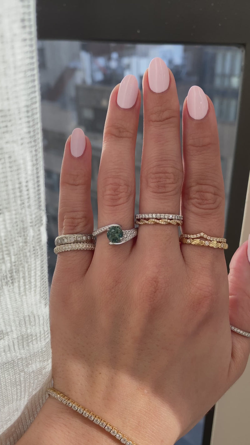 caption:Shown with 1.2ct round Montana Sapphire in platinum