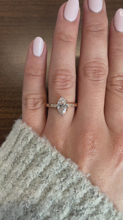 caption:Shown with 1.50ct marquise diamond set in rose gold