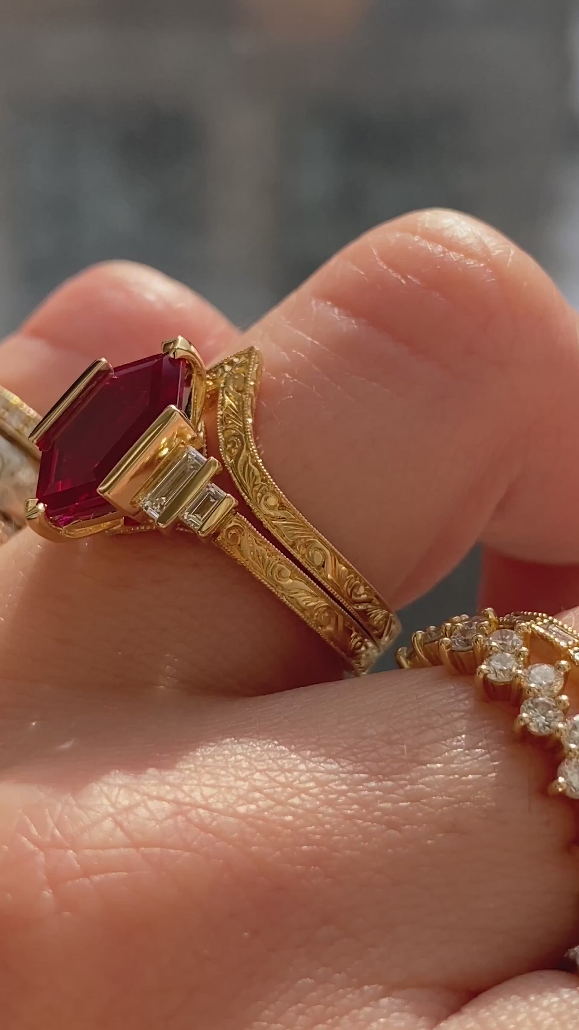 caption:Shown stacked with Decca 2.5ct ruby in 18k yellow gold 