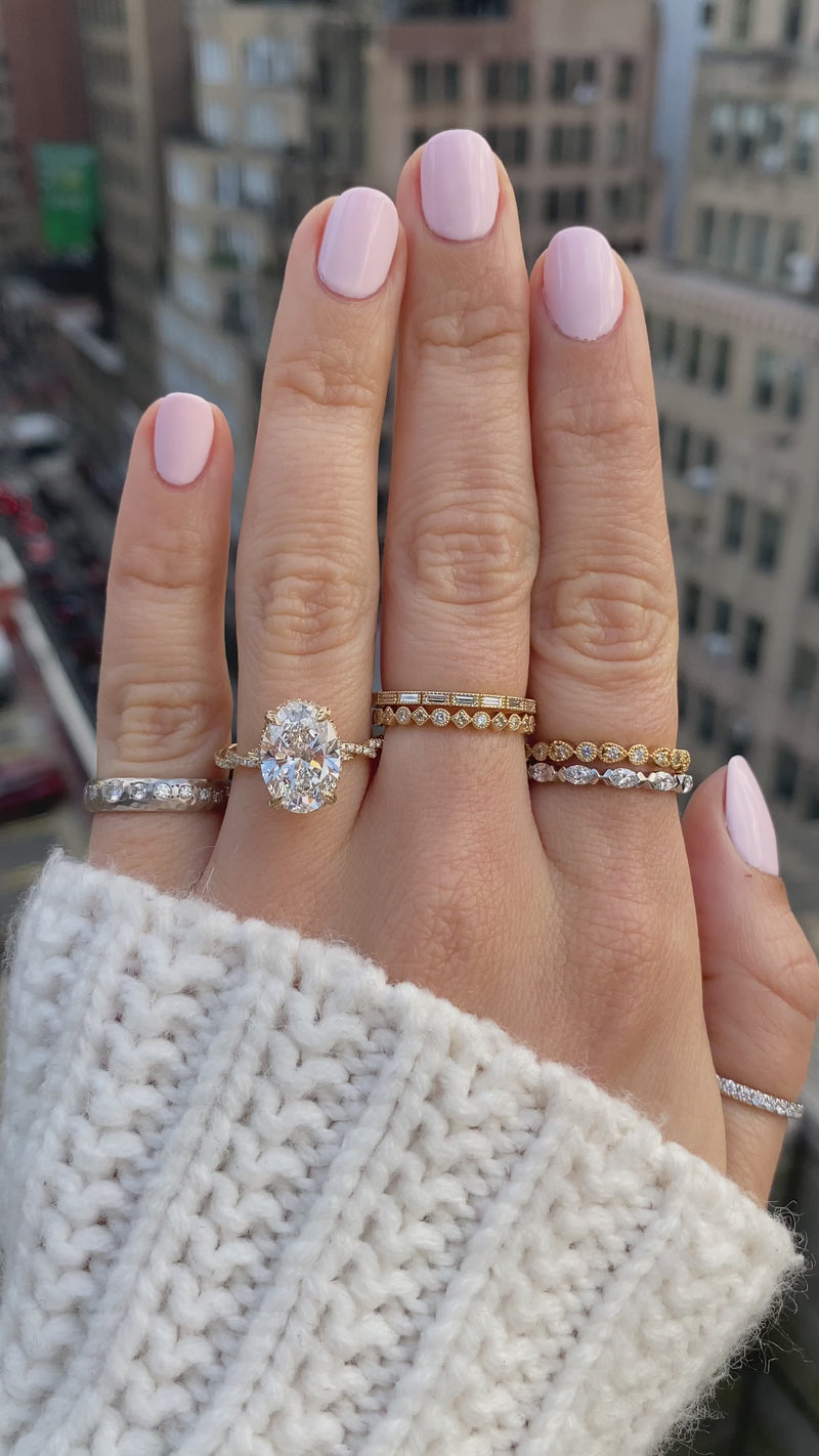 caption:Shown with 3ct oval cut diamond in 14k yellow gold