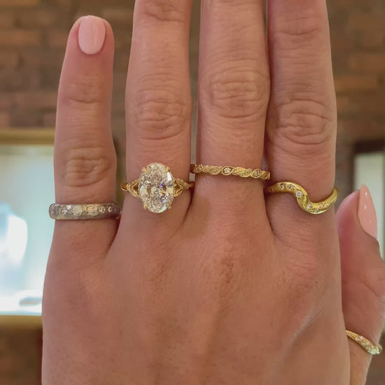caption:Shown with 2.5ct oval in 18k yellow gold 