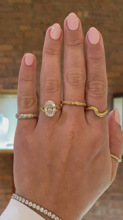 caption:Shown with 2.5ct oval in 18k yellow gold 