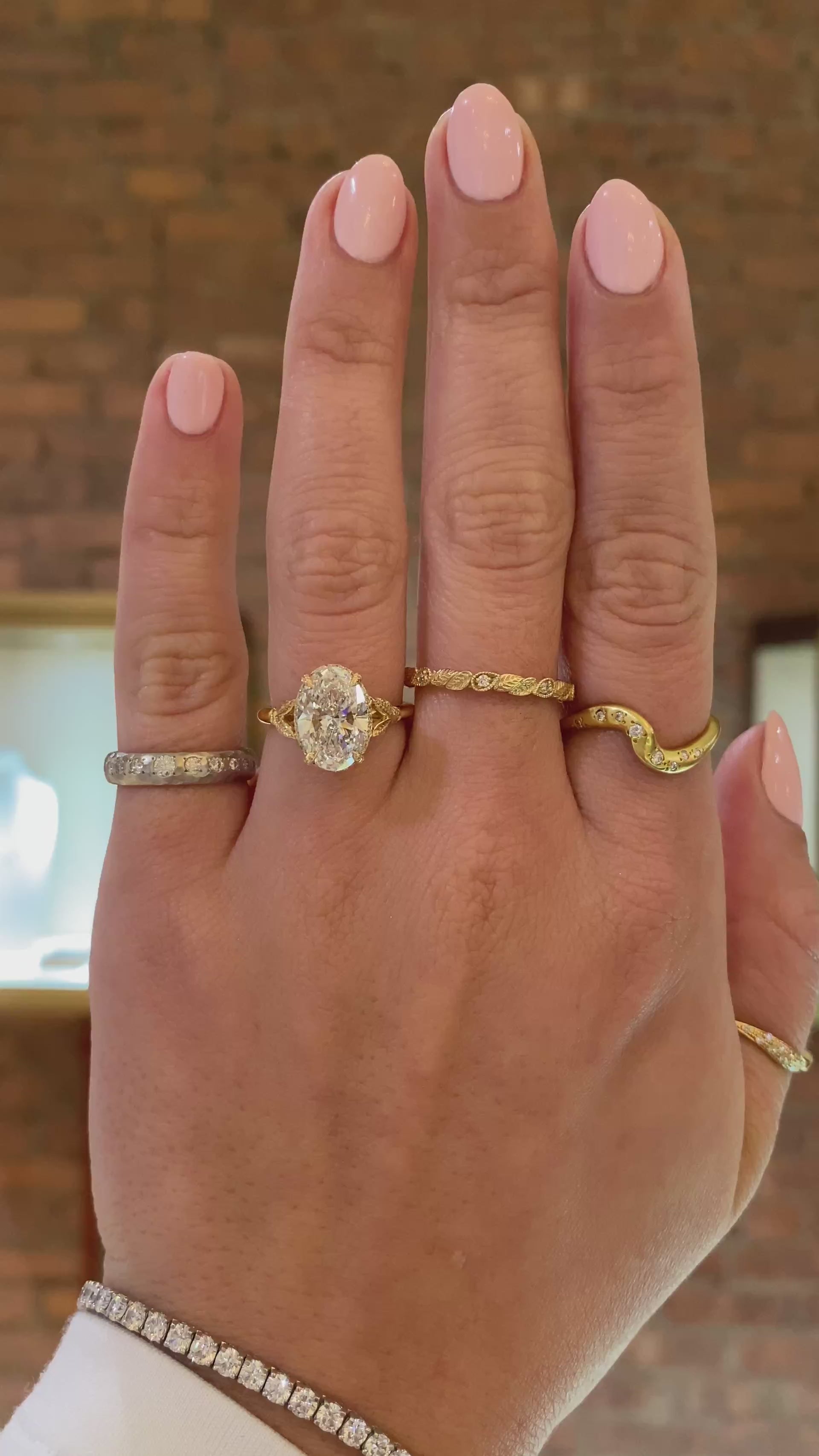 caption:Shown with 2.5ct oval in 18k yellow gold 