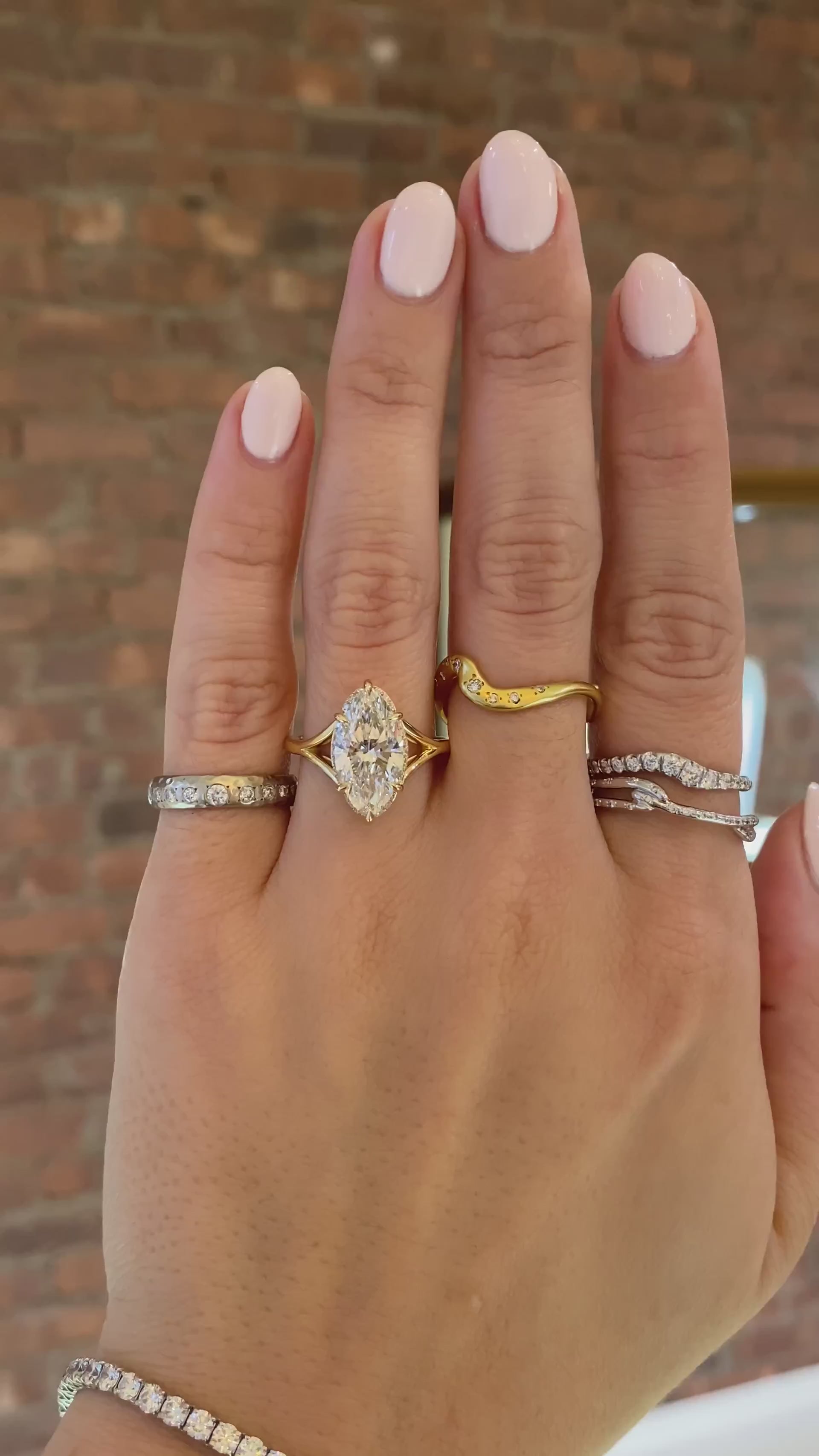 caption:Shown with 3ct marquise in 18k yellow gold 