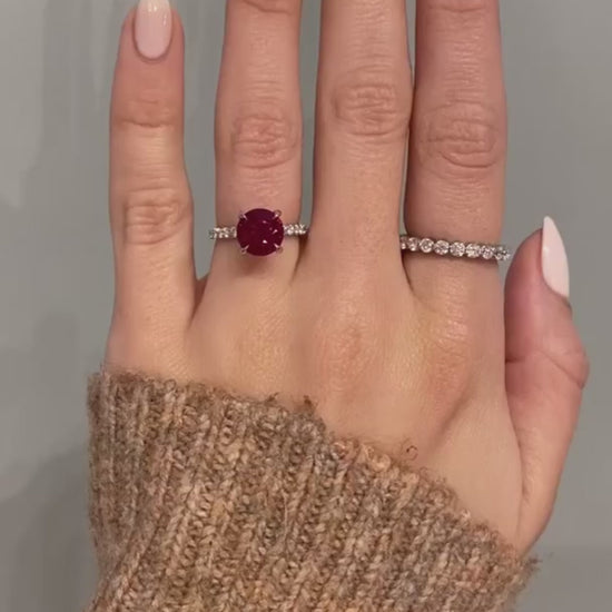 caption:Shown with 2ct ruby round cut diamond set in platinum