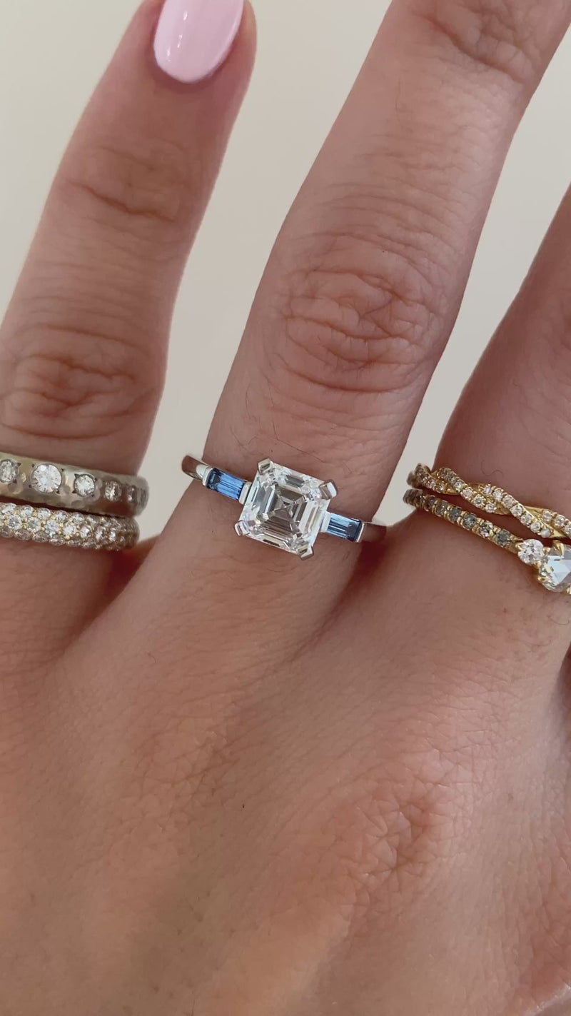caption: Shown with 1.2ct asscher cut diamond in 14k white gold
