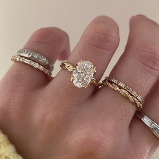 caption:Shown with 2.5ct oval in 14k yellow gold