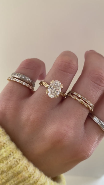 caption:Shown with 2.5ct oval in 14k yellow gold