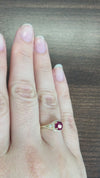 caption:Shown with cushion cut ruby in 14k yellow gold