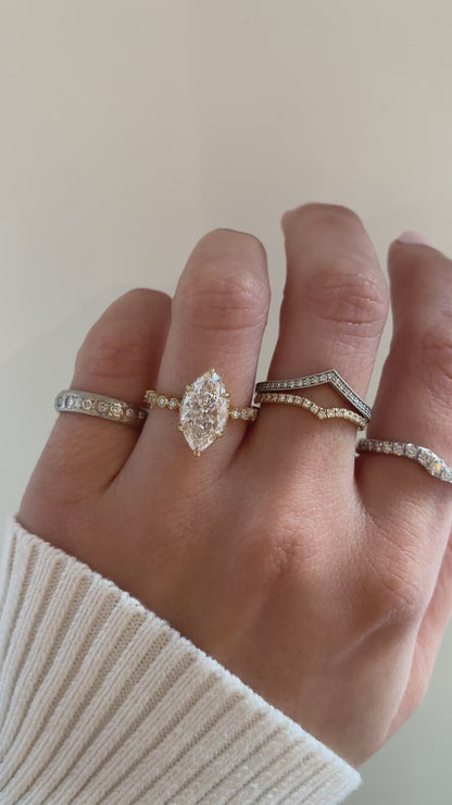 caption:Shown with 2ct marquise in 14k yellow gold 