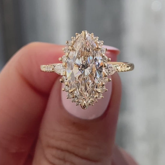 caption:Shown with 2.5ct marquise in 14k yellow gold 
