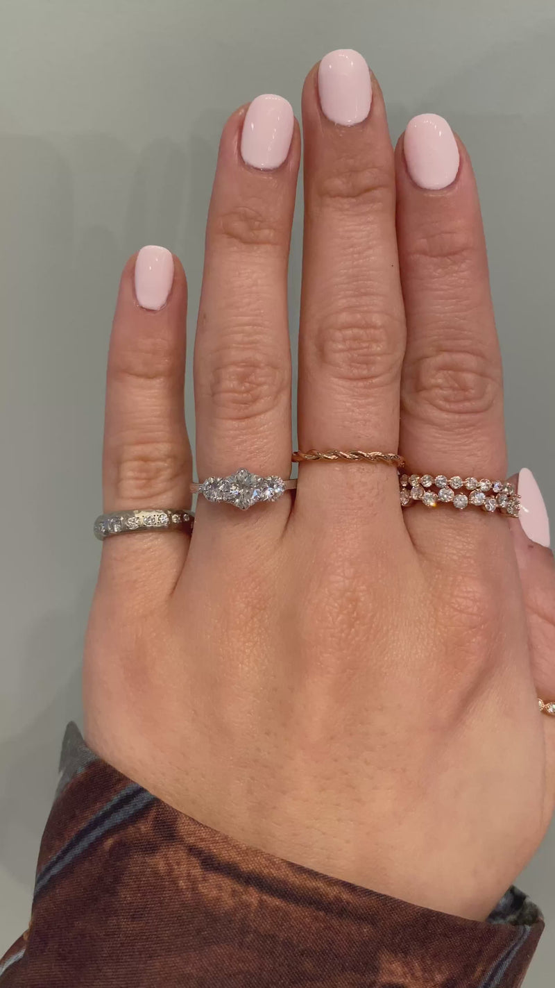 caption:Shown with 0.75ct round diamond center stone in 14k white gold