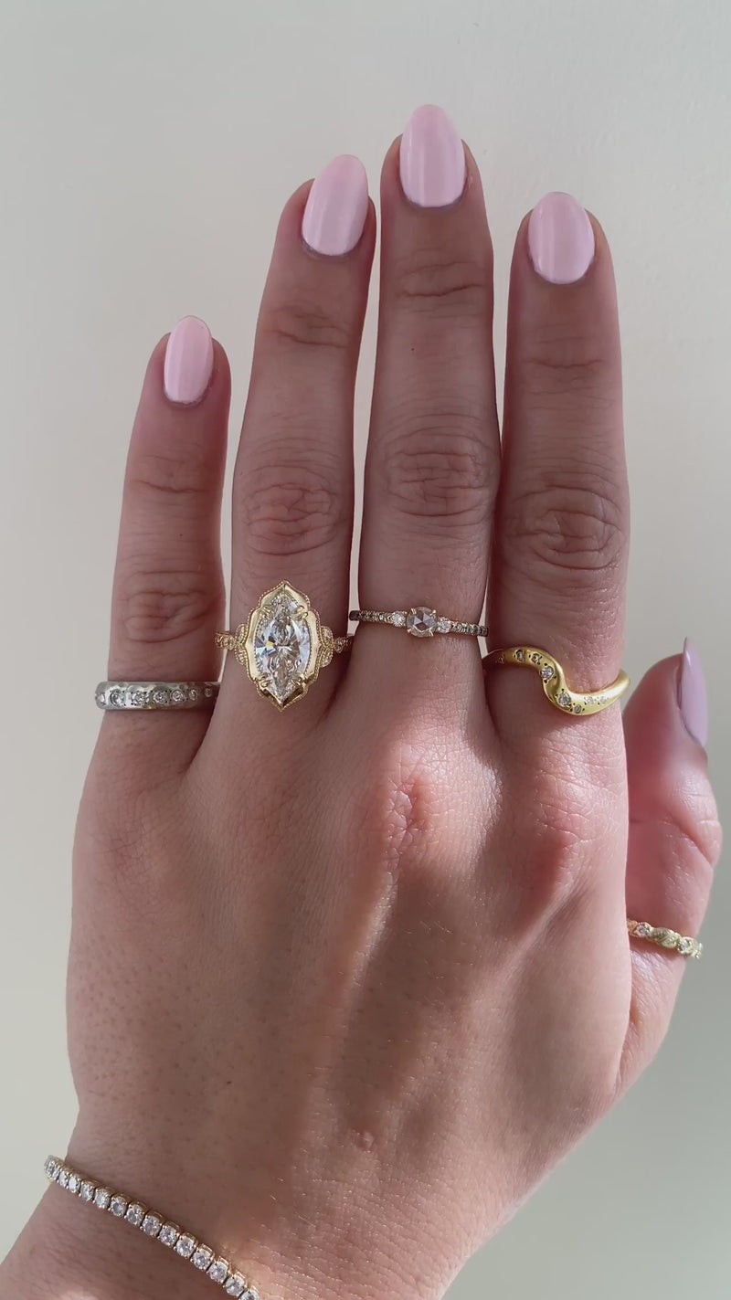 caption:Shown with 2ct marquise diamond in 18k yellow gold