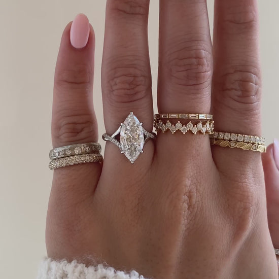 caption:Shown with 3ct marquise in platinum