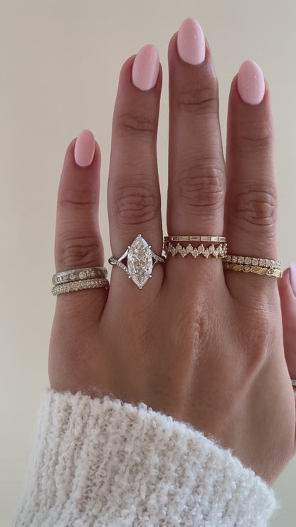 caption:Shown with 3ct marquise in platinum