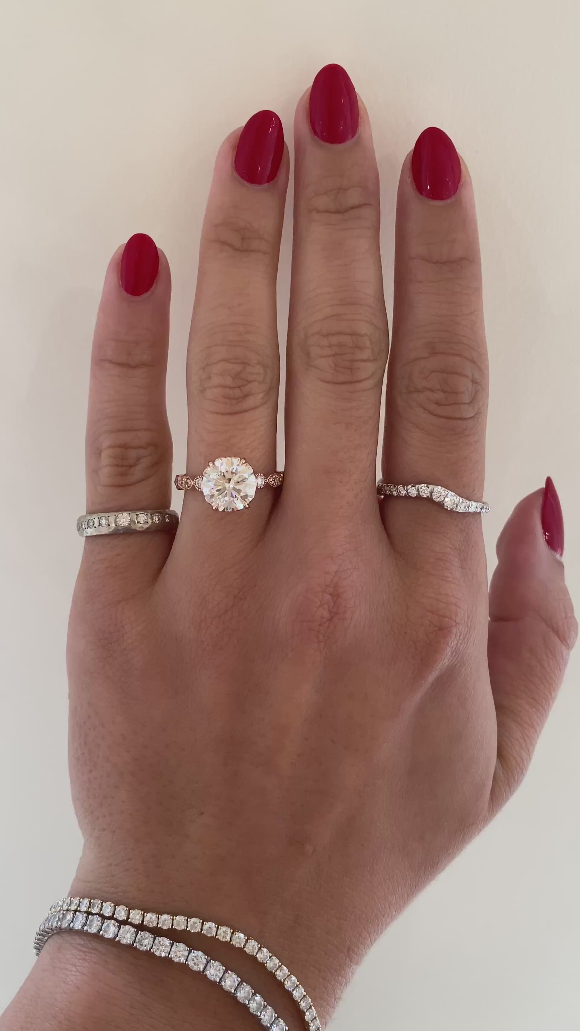 caption:Shown with 2.5ct round diamond in 14k rose gold