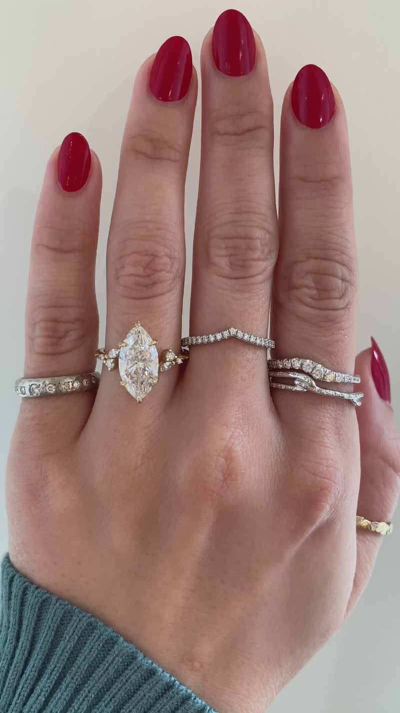 caption:Shown with 3ct marquise diamond