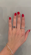caption:Shown with 2ct oval grey diamond in platinum