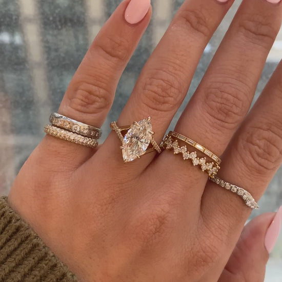 caption:Shown with 3ct marquise in 14k yellow gold