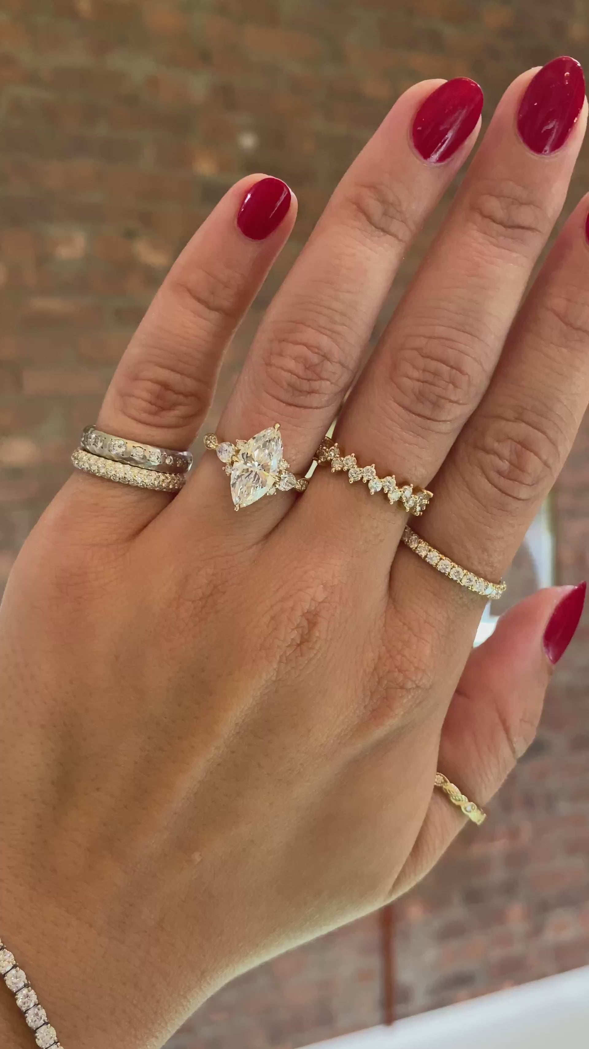 caption:Shown with 2ct marquise in 14k yellow gold 