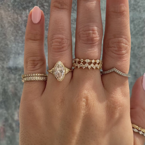 caption:Shown with 2ct marquise in 14k yellow gold 