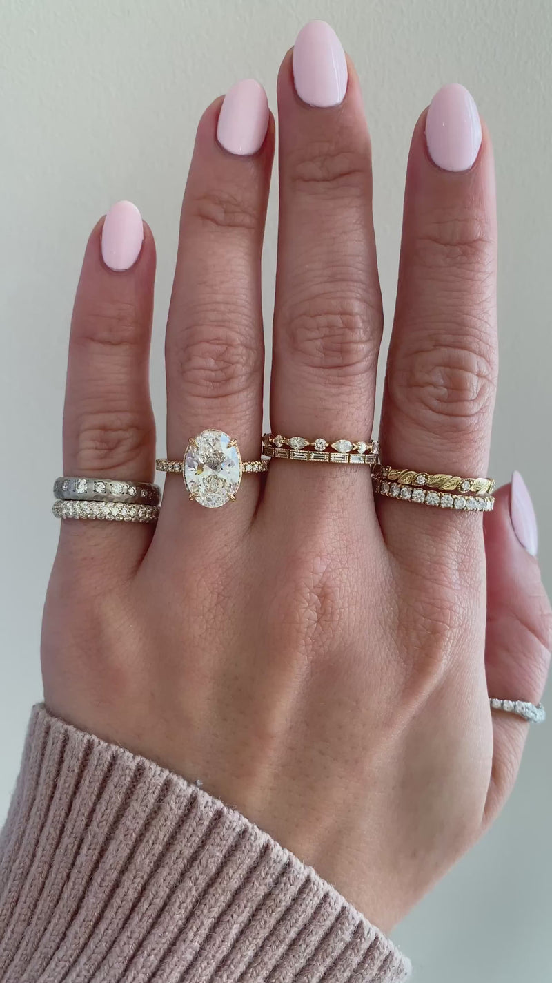 caption:Shown with 3ct oval diamond in 18k yellow gold
