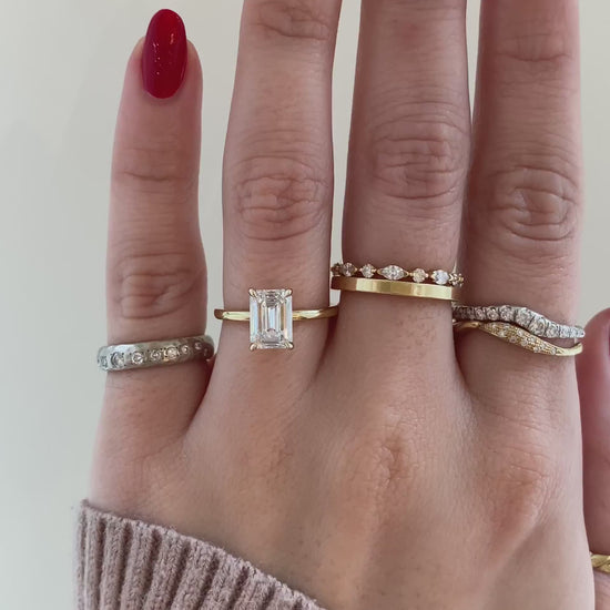 caption:Shown with 1.78ct emerald cut in 14k yellow gold 