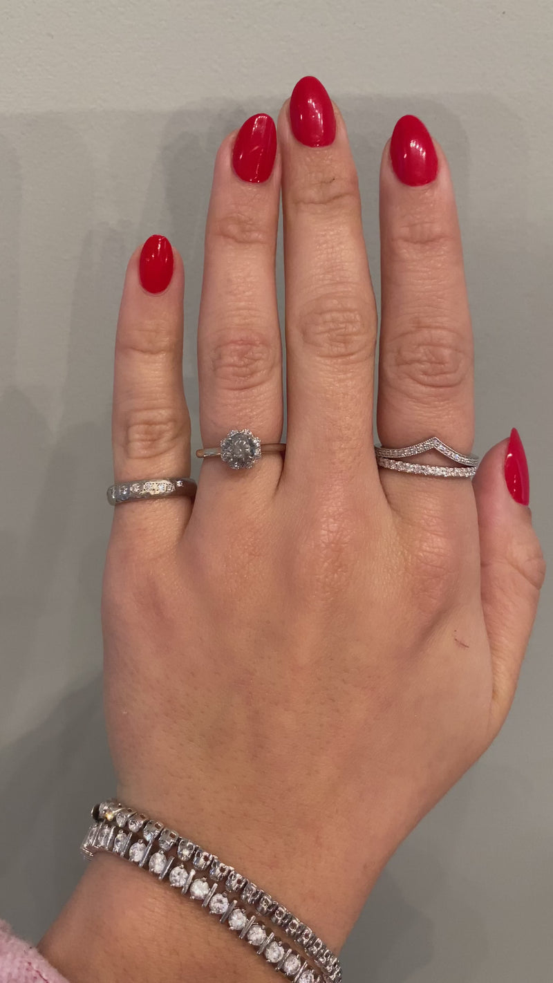 caption:Shown with 0.65ct round salt & pepper diamond in platinum