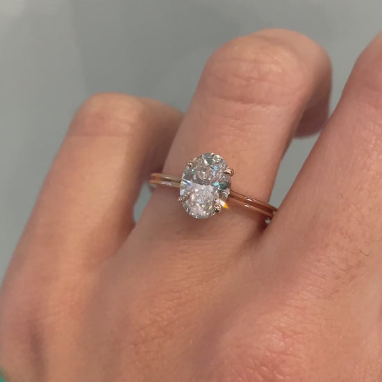 caption:Shown in 14k rose gold with 1.2ct oval diamond