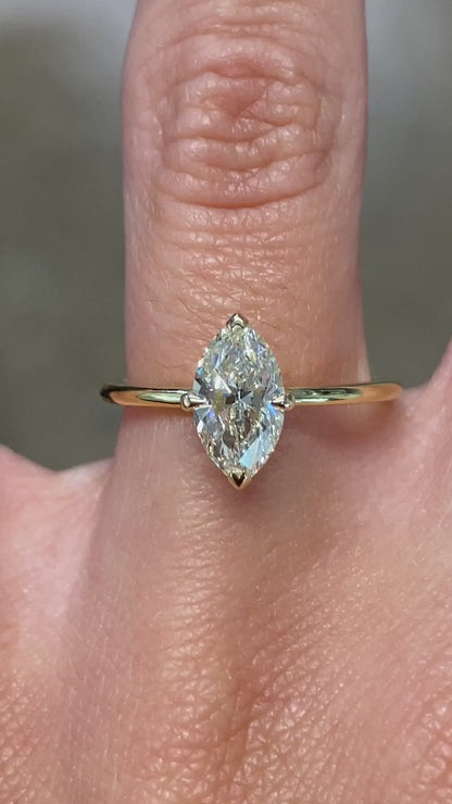 caption:Shown in 18k yellow gold with 1ct marquise diamond