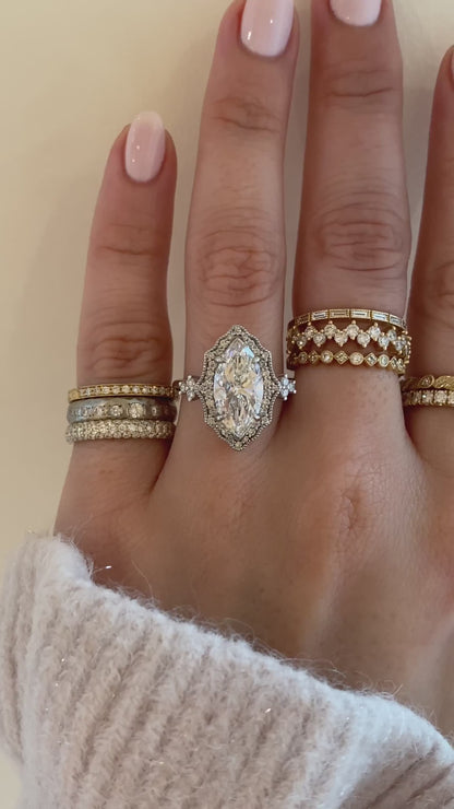 caption:Shown with 3ct marquise in platinum