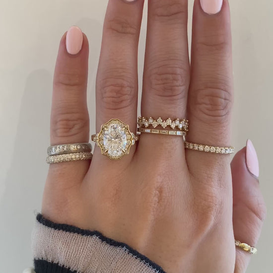 caption:Shown with 3ct oval in 18k yellow gold 