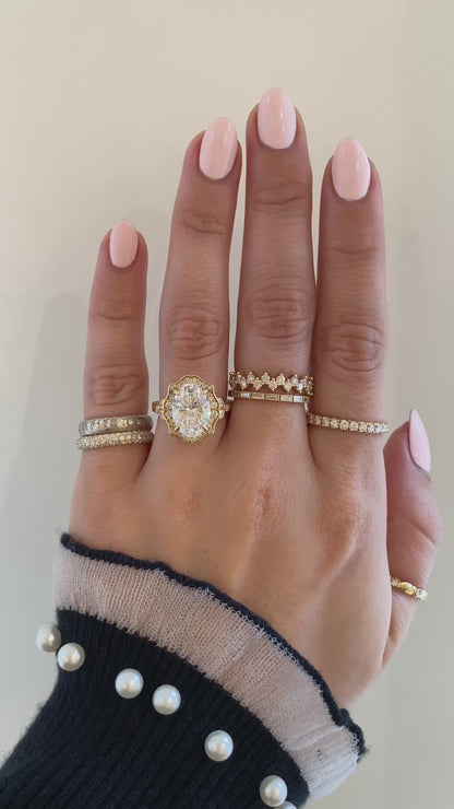 caption:Shown with 3ct oval in 18k yellow gold 