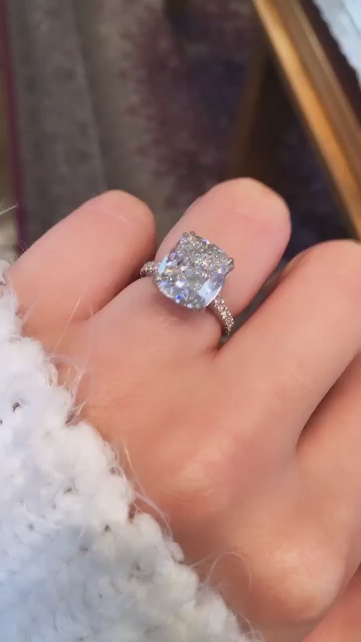 caption:Shown with 5ct cushion cut diamond in platinum