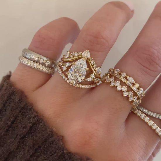 caption:Shown with 2ct pear in 18k yellow gold