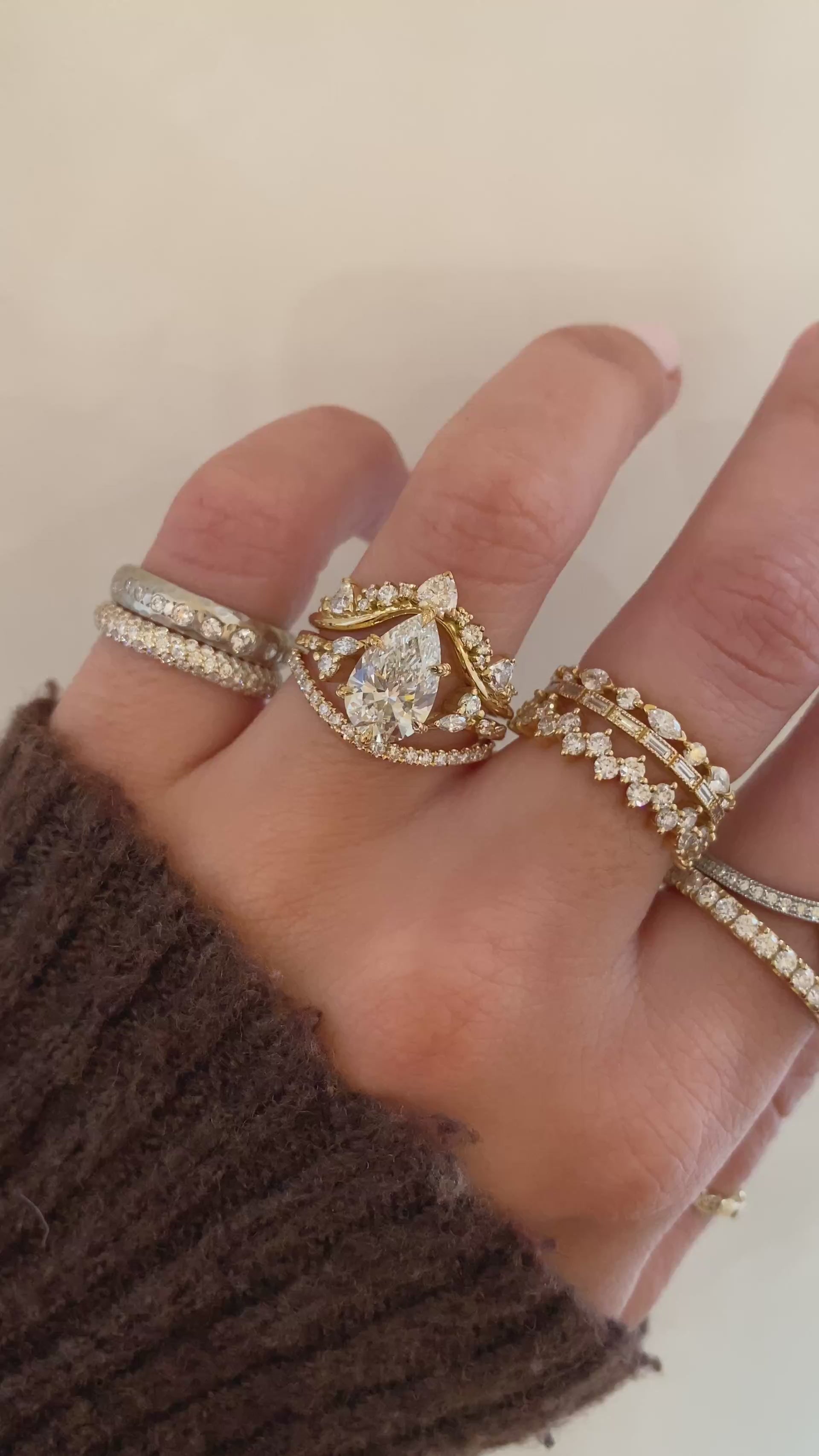 caption:Shown with 2ct pear in 18k yellow gold