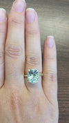 caption:Shown with oval aquamarine in yellow gold