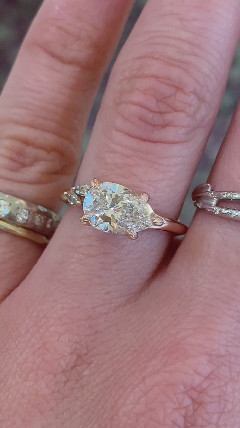 caption:Shown with 1.5ct pear diamond in 14k rose gold