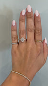 caption:Shown with 1.5ct oval diamond in 14k yellow gold