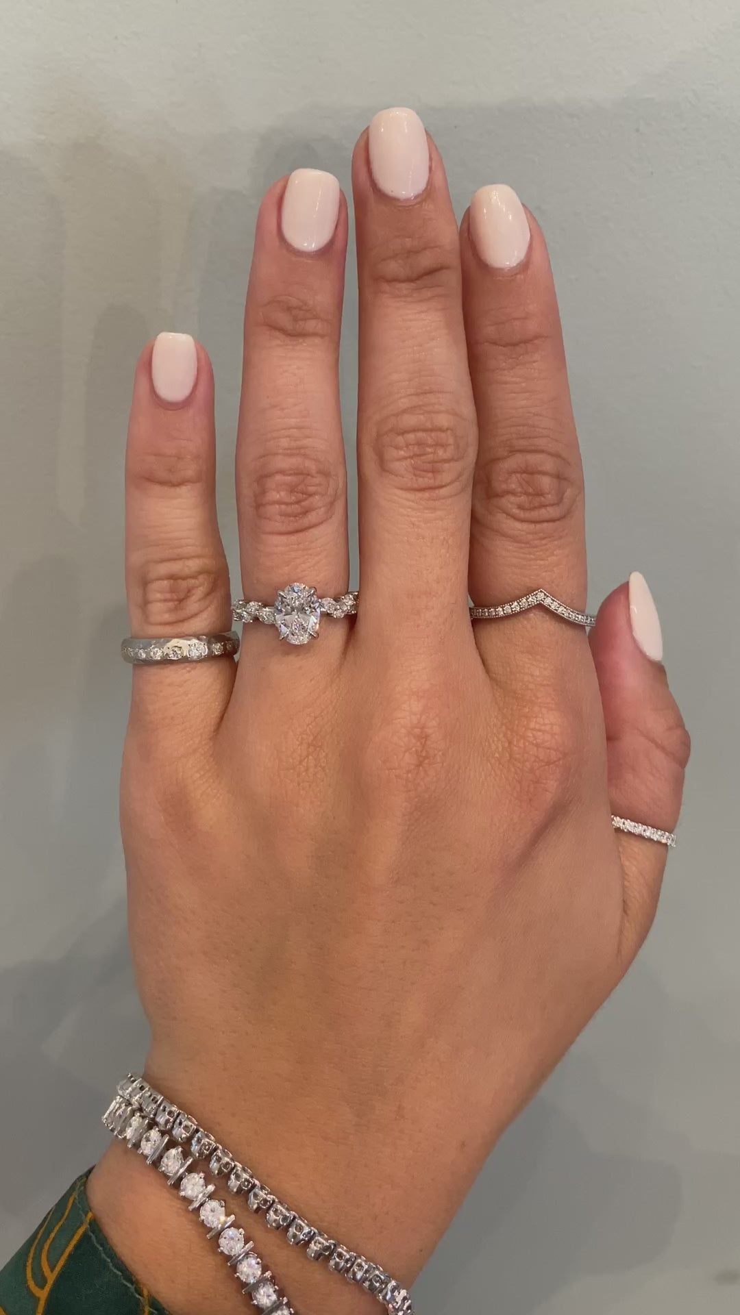 caption:Shown with 1.3ct oval diamond in platinum