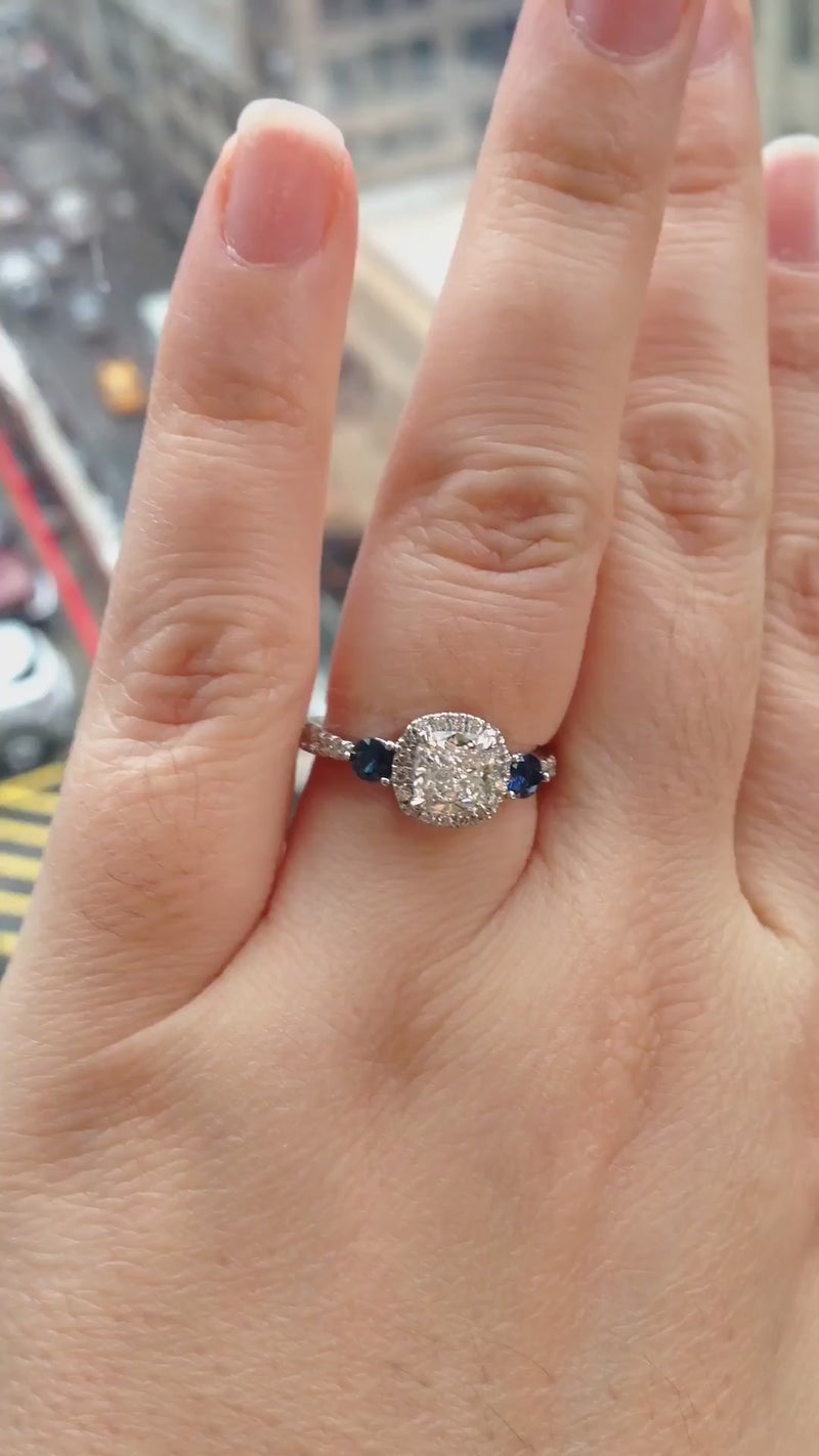 caption:Shown with cushion cut diamond in platinum