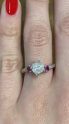 caption:Shown with rough cut diamond & ruby side stones in platinum