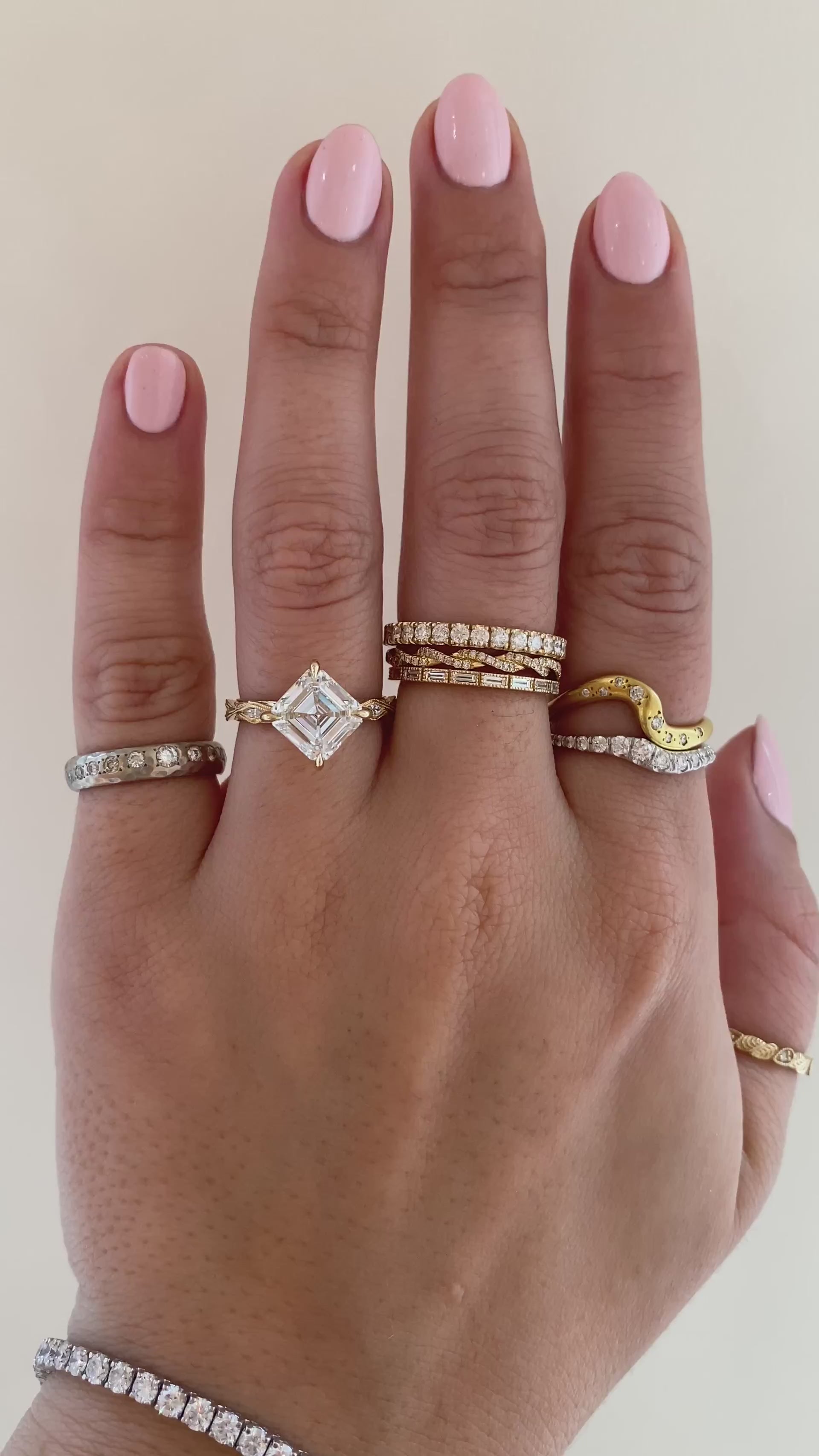 caption:Shown with 2.75ct Asscher in 14k yellow gold