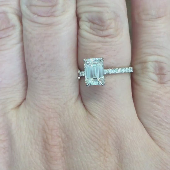 caption:Shown with 1.6ct emerald cut diamond in platinum